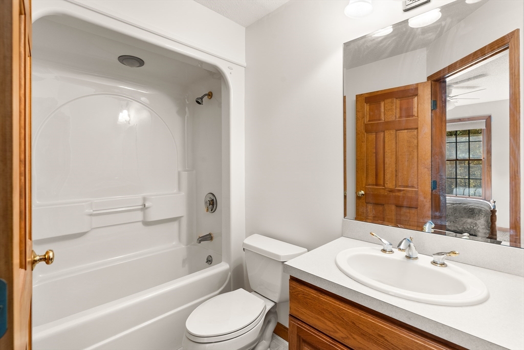 59 St Germain Road Hampden, MA 01036 - Photo 26 of 42 a bathroom with a sink a toilet and shower