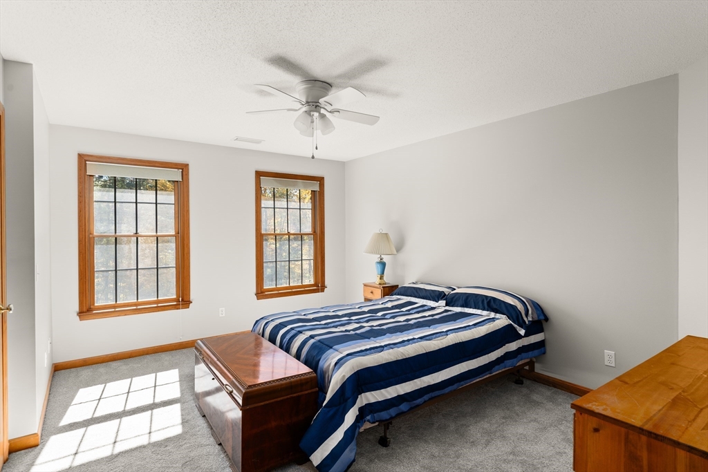 59 St Germain Road Hampden, MA 01036 - Photo 34 of 42 a bedroom with a bed and a window