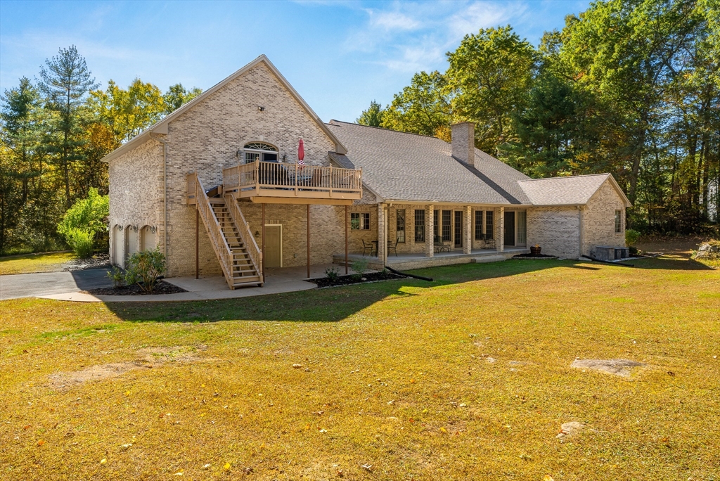 59 St Germain Road Hampden, MA 01036 - Photo 9 of 42 a front view of a house with swimming pool