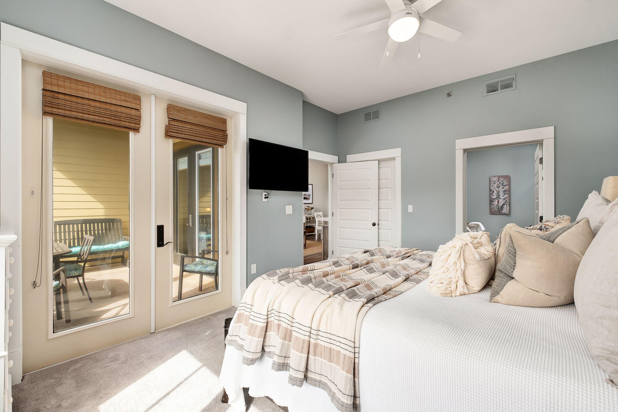 2050 West County Highway 30A, Unit M1310 Santa Rosa Beach, FL 32459 - Photo 22 of 63 a bedroom with a bed and a flat screen tv