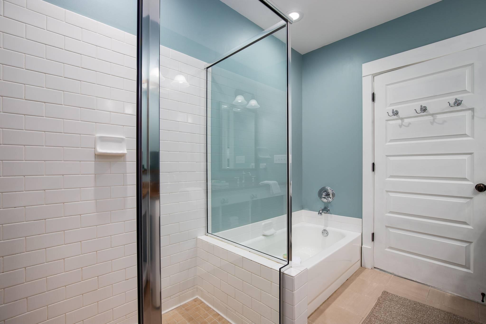 2050 West County Highway 30A, Unit M1310 Santa Rosa Beach, FL 32459 - Photo 24 of 63 a bathroom with a bathtub and shower