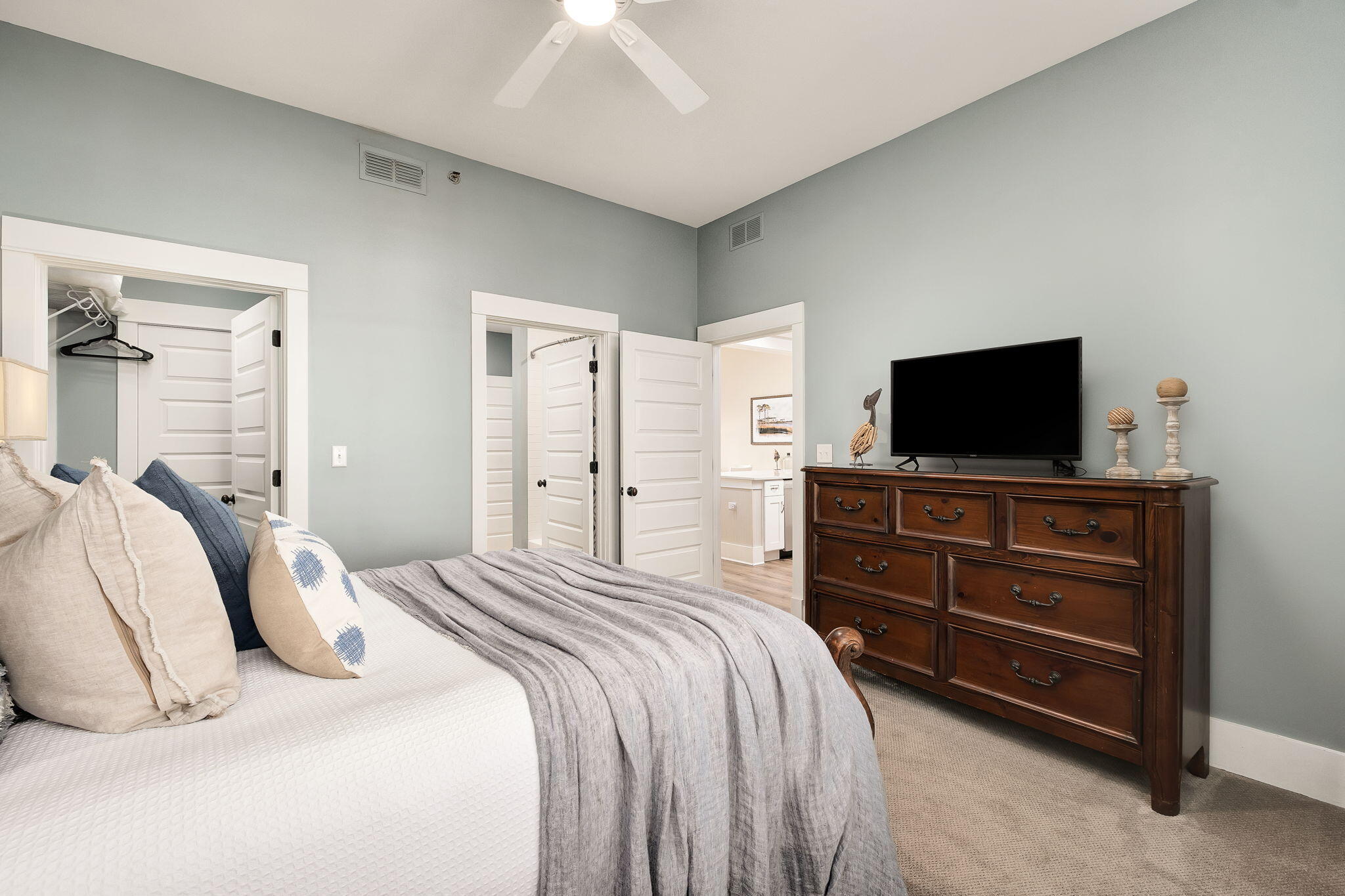 2050 West County Highway 30A, Unit M1310 Santa Rosa Beach, FL 32459 - Photo 26 of 63 a bedroom with a bed and a flat screen tv