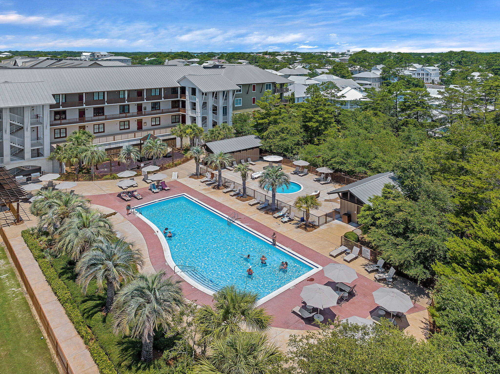 2050 West County Highway 30A, Unit M1310 Santa Rosa Beach, FL 32459 - Photo 46 of 63 an aerial view of a house with a swimming pool