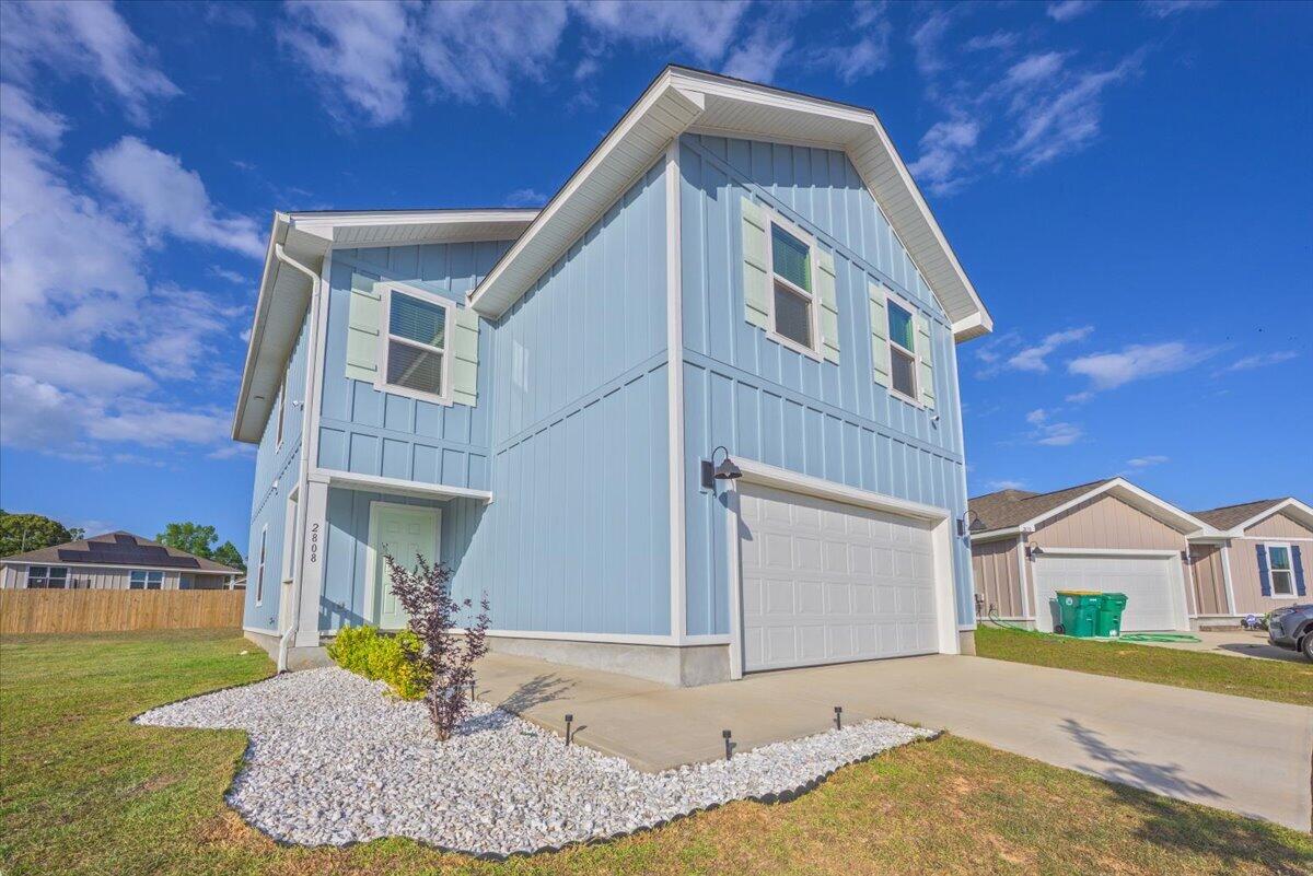 2808 Tallgrass Court Crestview, FL 32536 - Photo 1 of 49 a front view of a house with a yard