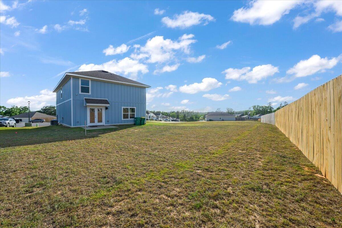 2808 Tallgrass Court Crestview, FL 32536 - Photo 42 of 49 a view of a house with a yard