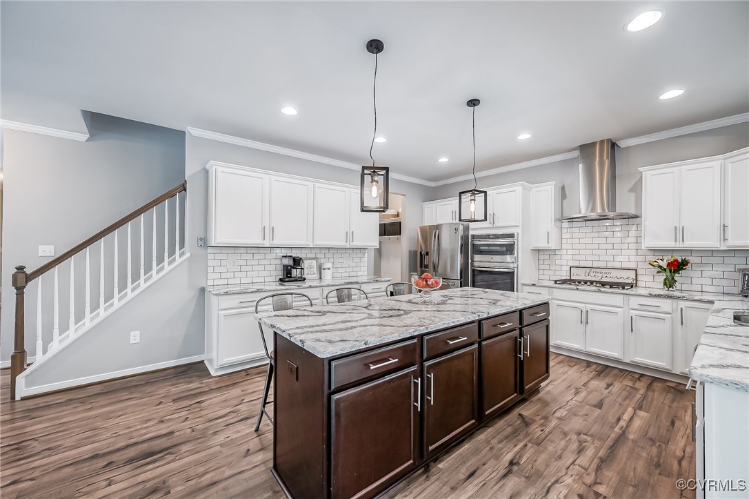 8006 Bole Hat Road Chesterfield, VA 23832 - Photo 17 of 47 Kitchen with wall chimney range hood, stainless st
