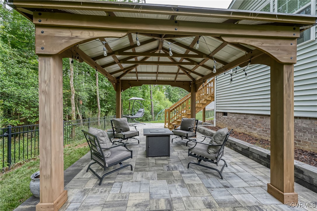 8006 Bole Hat Road Chesterfield, VA 23832 - Photo 40 of 47 View of patio / terrace featuring fence, a fire pi