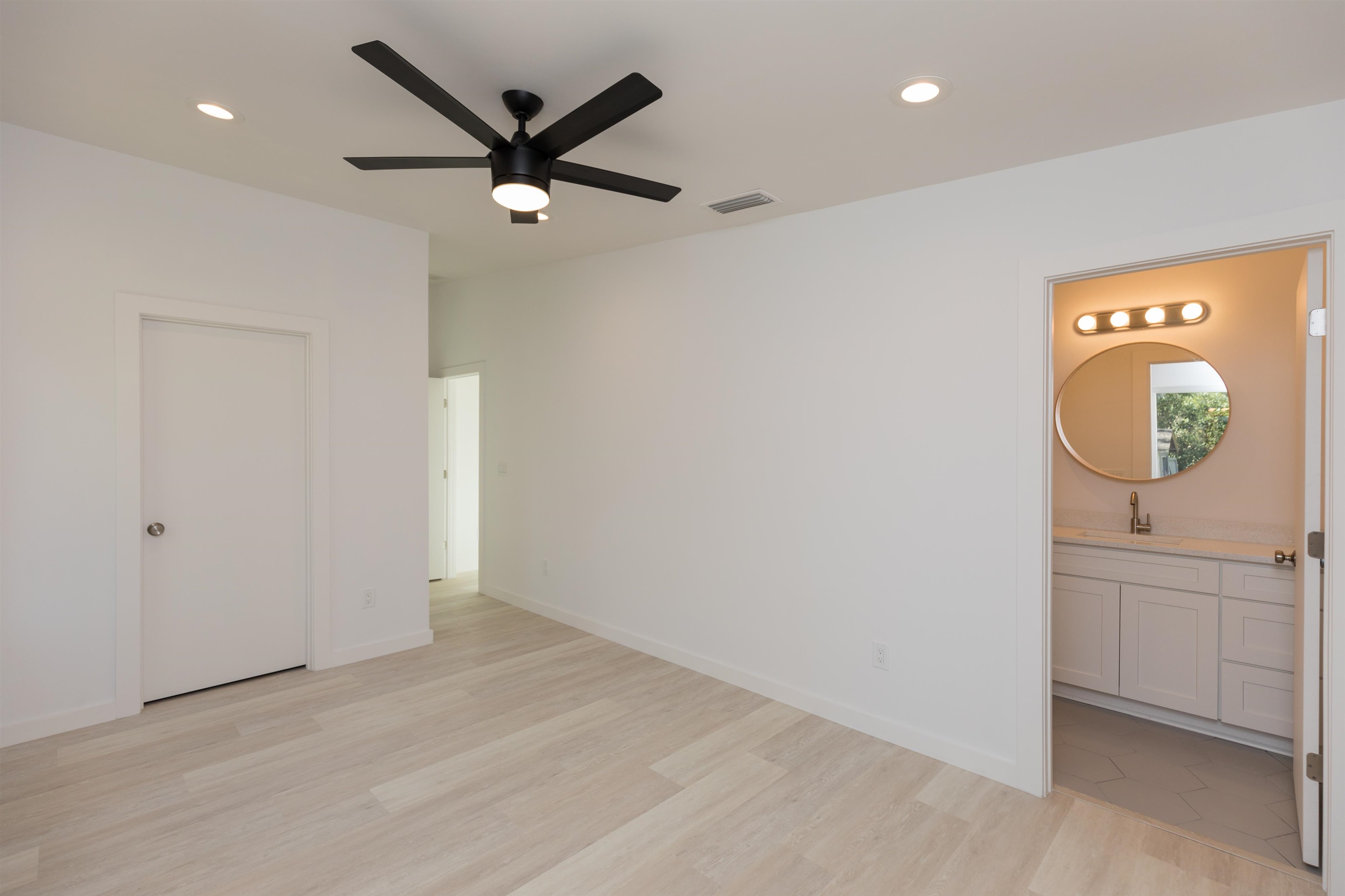561 Live Oak Street St. Augustine, FL 32084 - Photo 23 of 30 an empty room with window and a ceiling fan