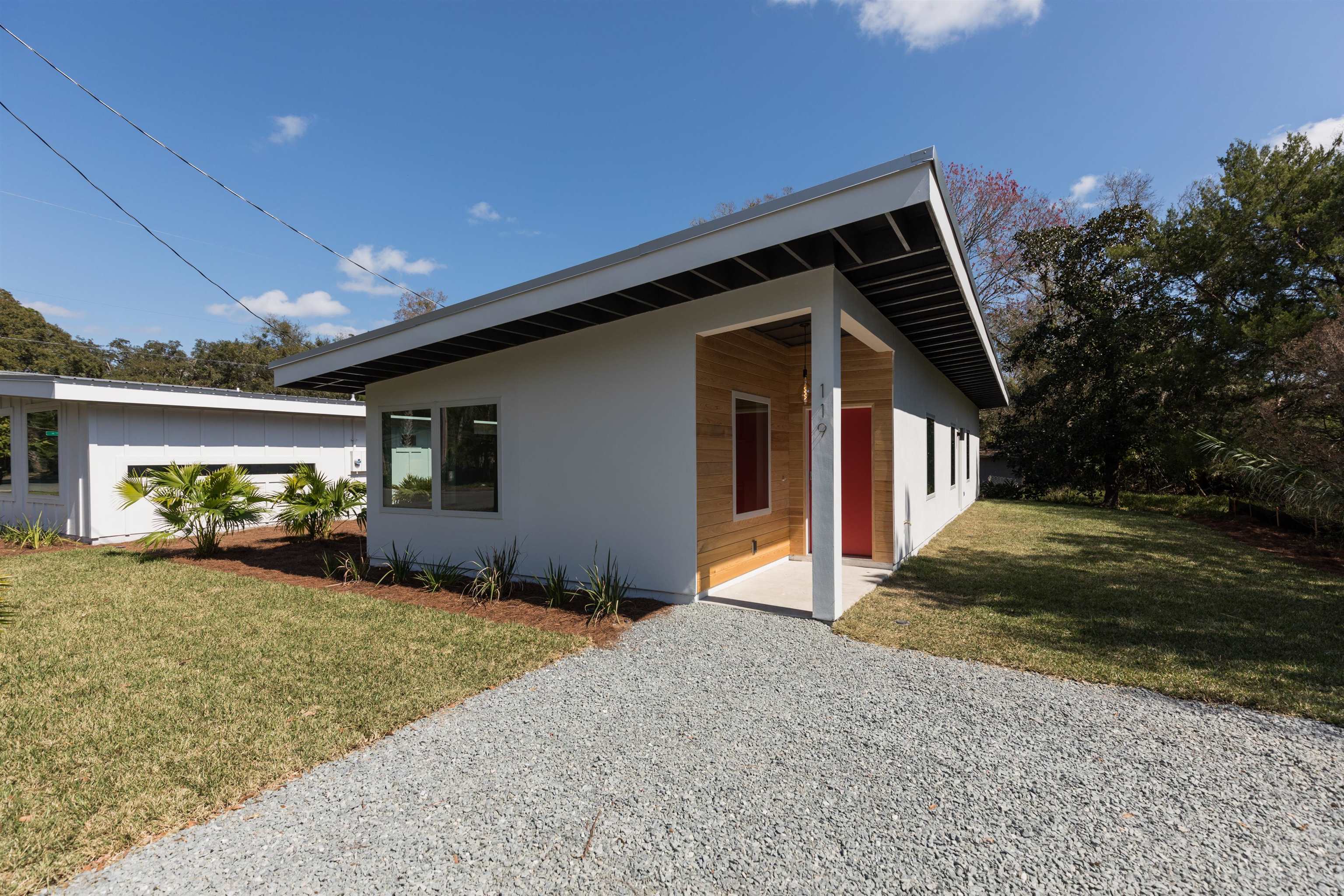 561 Live Oak Street St. Augustine, FL 32084 - Photo 27 of 30 a view of a house with backyard and porch