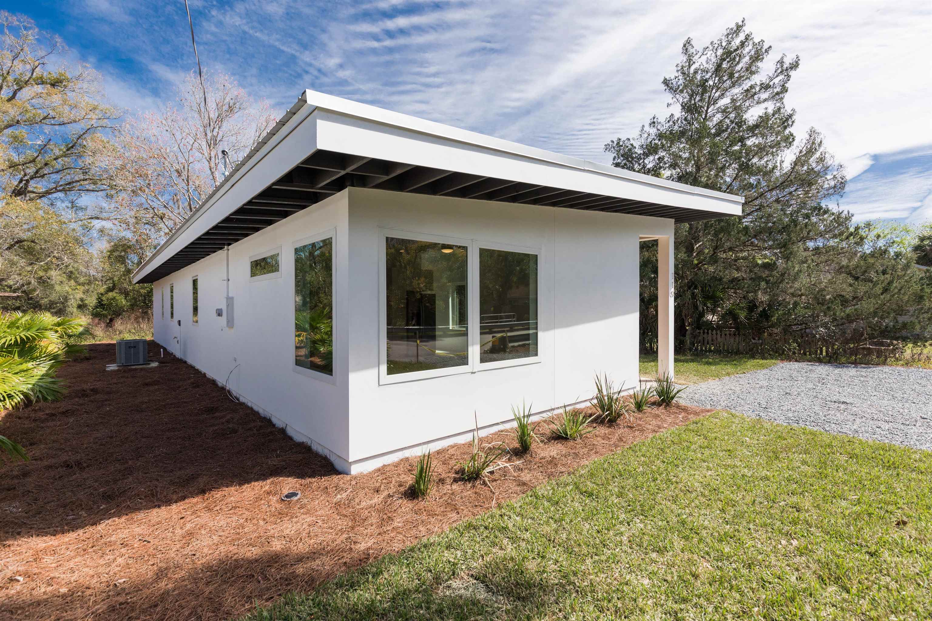 561 Live Oak Street St. Augustine, FL 32084 - Photo 29 of 30 a view of house with backyard