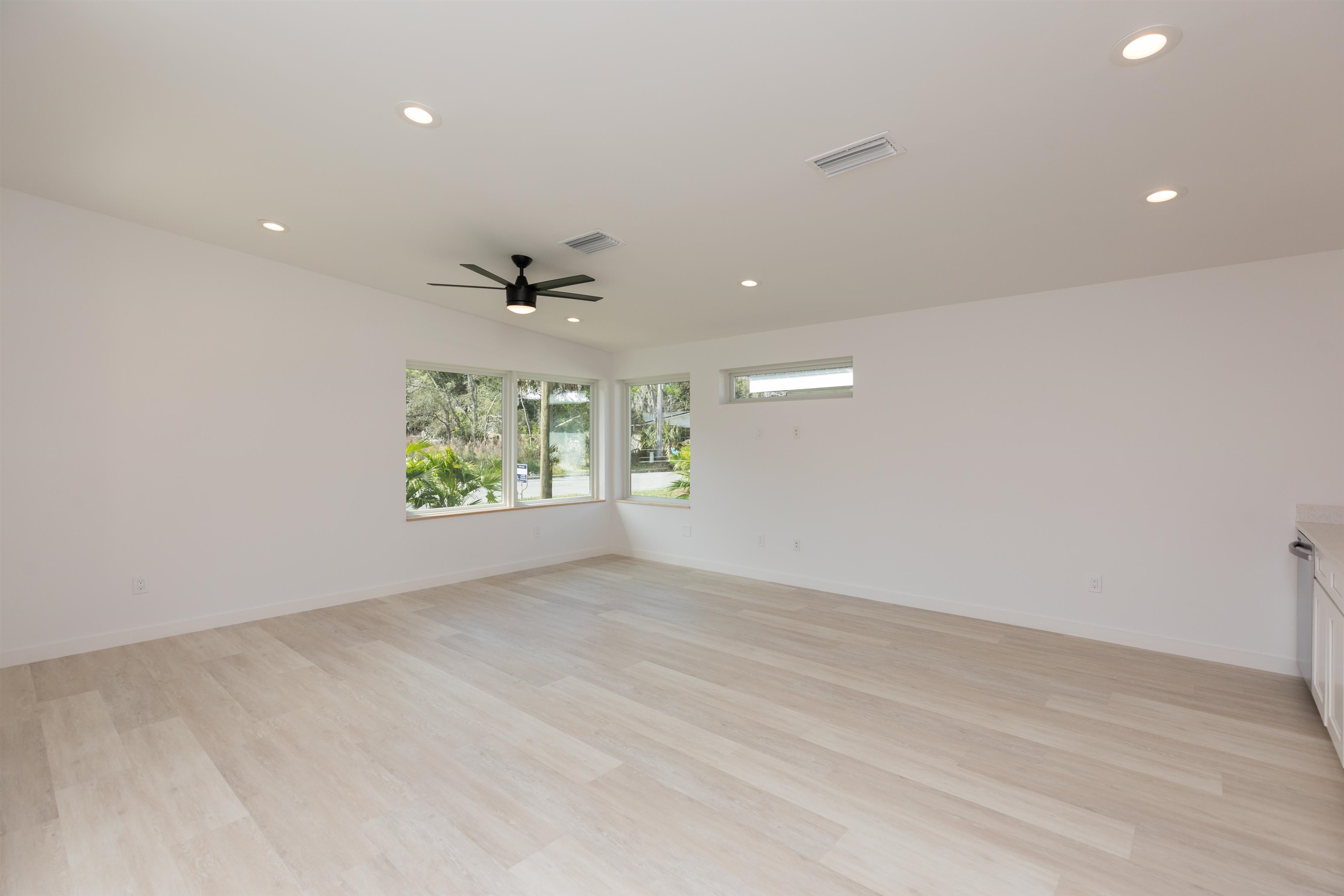 561 Live Oak Street St. Augustine, FL 32084 - Photo 10 of 30 an empty room with a window and a ceiling fan
