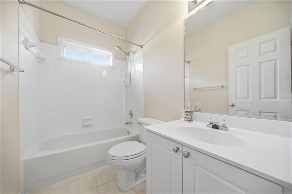 111 Stonegate Lane Canton, GA 30114 - Photo 19 of 30 a bathroom with a sink a toilet and shower