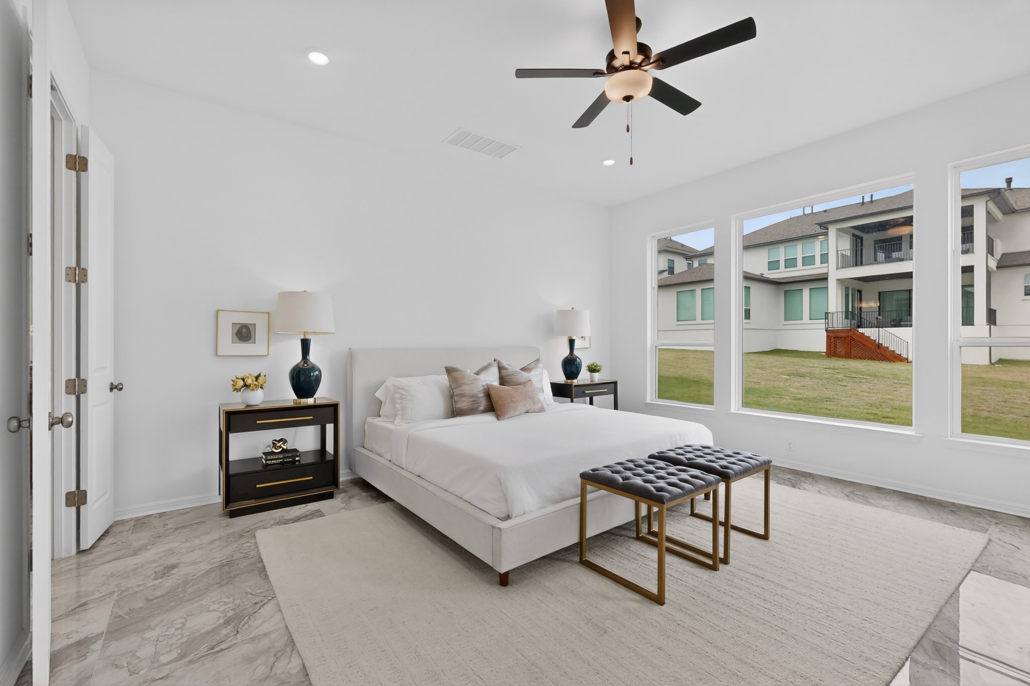 2308 Mondello Path Leander, TX 78641 - Photo 11 of 39 An airy bedroom with generous natural light and a broad view of the surrounding neighborhood.