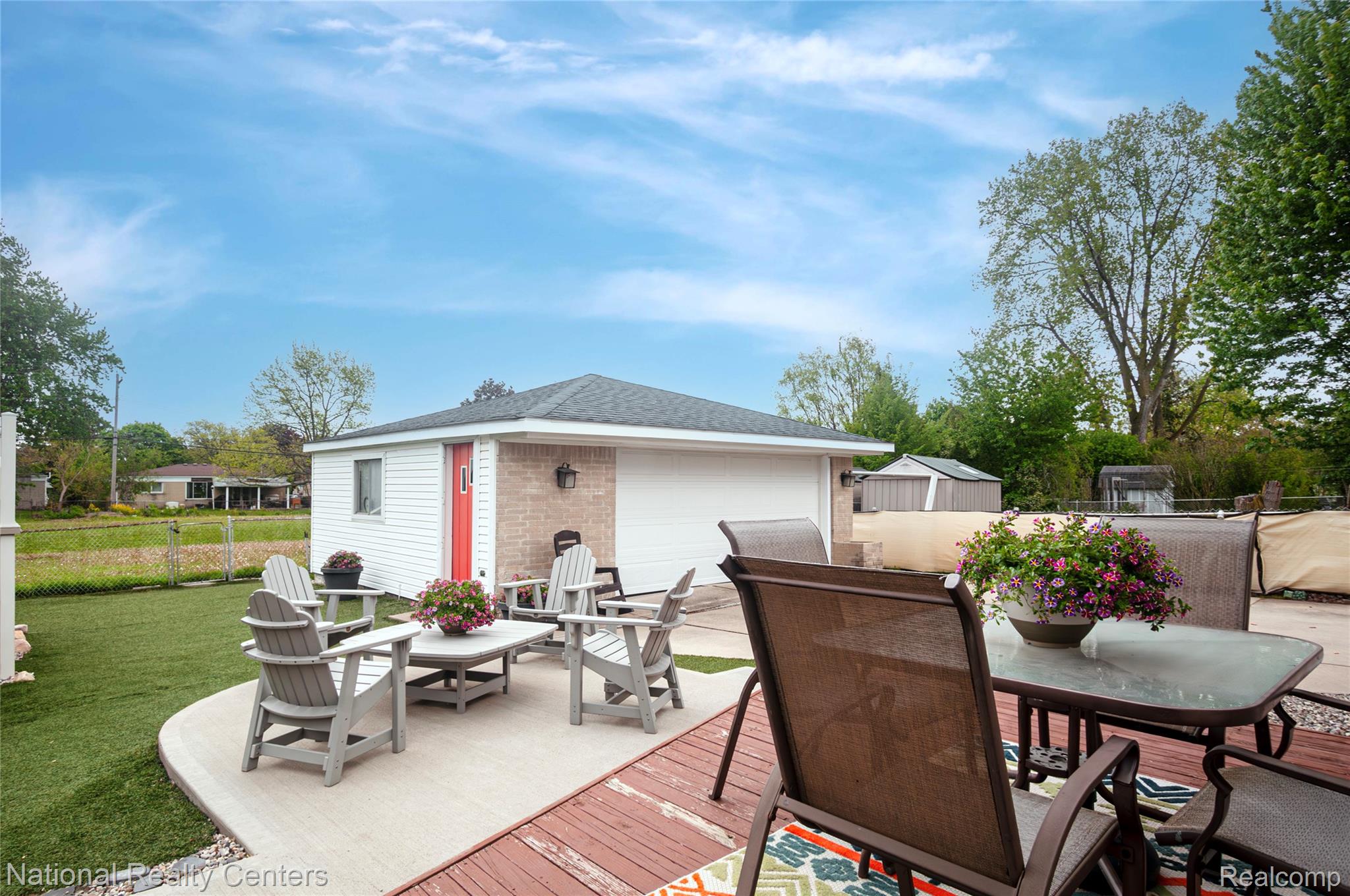 2446 Milverton Road Troy, MI 48083 - Photo 36 of 41 Wooden terrace with an outdoor structure, outdoor dining area, and a patio