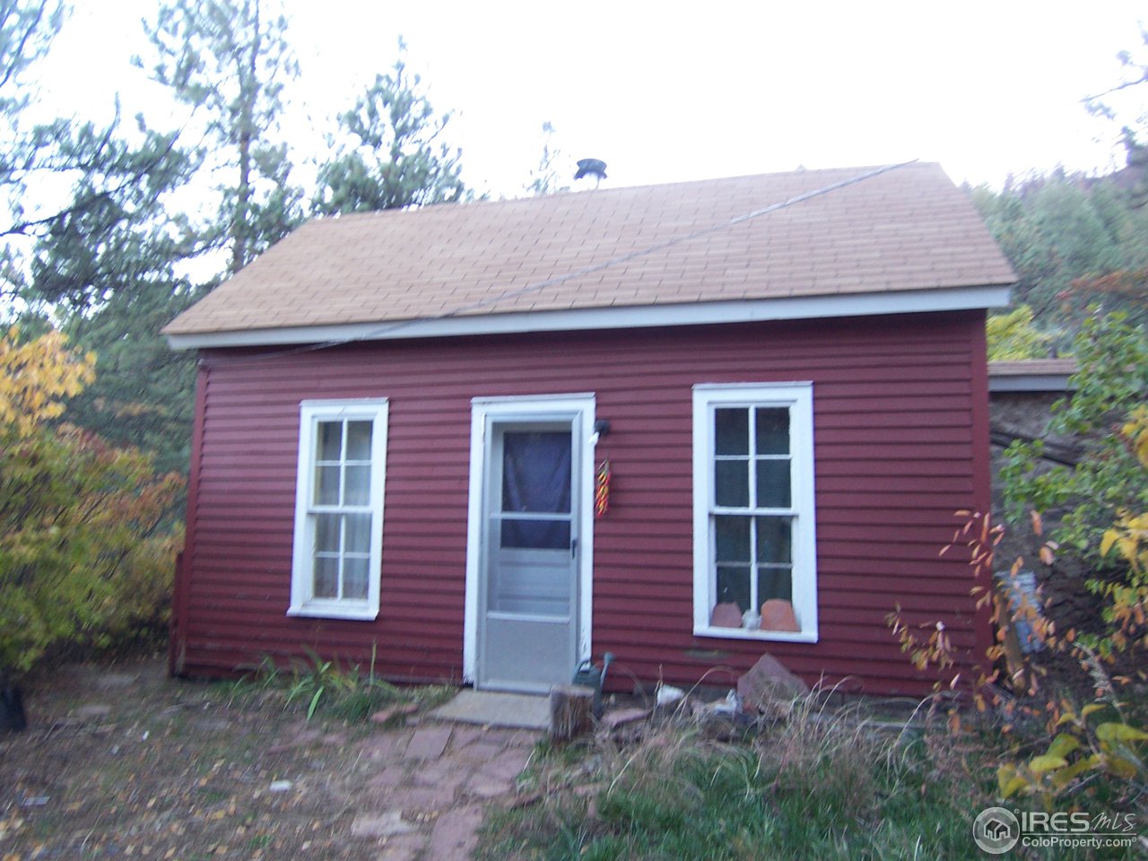 223 Gold Run Road Boulder, CO 80302 - Photo 15 of 18 a front view of a house with garden