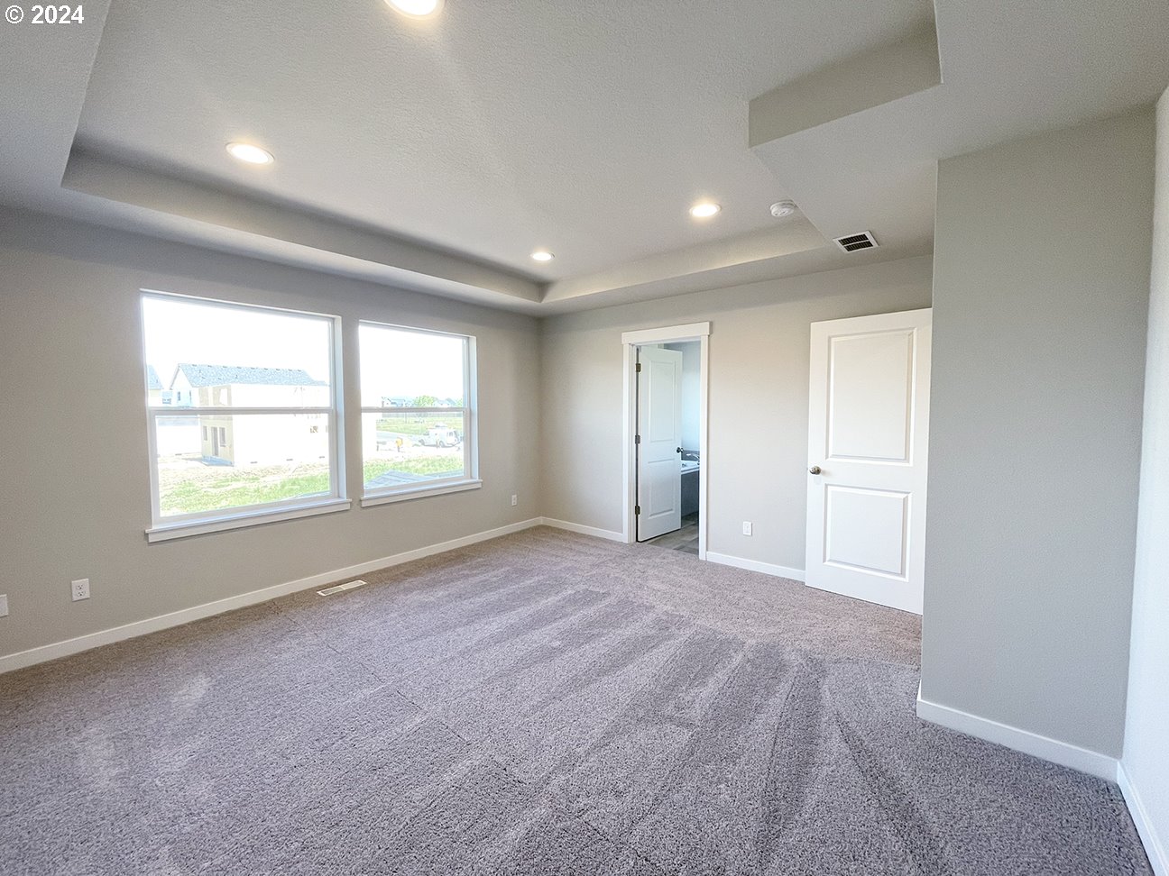 8720 North 3rd Street, Unit 57 Ridgefield, WA 98642 - Photo 11 of 24 a view of an empty room with a window