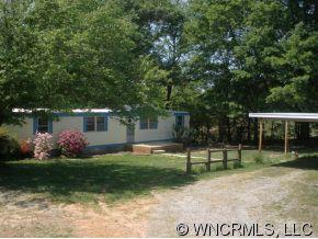 2017 West V Thompson Road Rutherfordton, NC 28139 - Photo 2 of 12 a front view of a house with garden