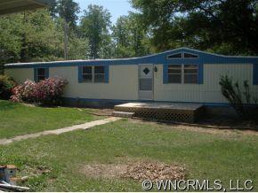 2017 West V Thompson Road Rutherfordton, NC 28139 - Photo 3 of 12 a front view of a house with garden