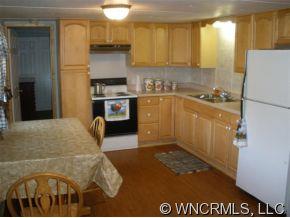 2017 West V Thompson Road Rutherfordton, NC 28139 - Photo 4 of 12 a kitchen with a refrigerator sink and stove