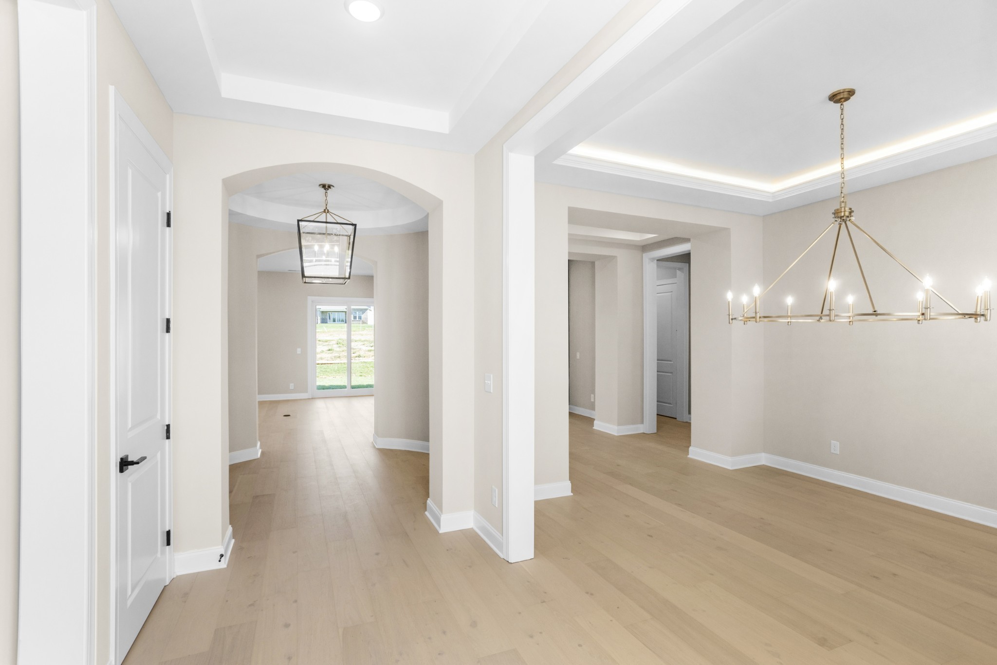 5955 Hunt Vly Drive Spring Hill, TN 37174 - Photo 5 of 59 wooden floor in an empty room and a mirror
