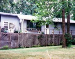 518 Devils Hole Road Mount Pocono, PA 18344 - Photo 1 of 1 a front view of a house with a garden