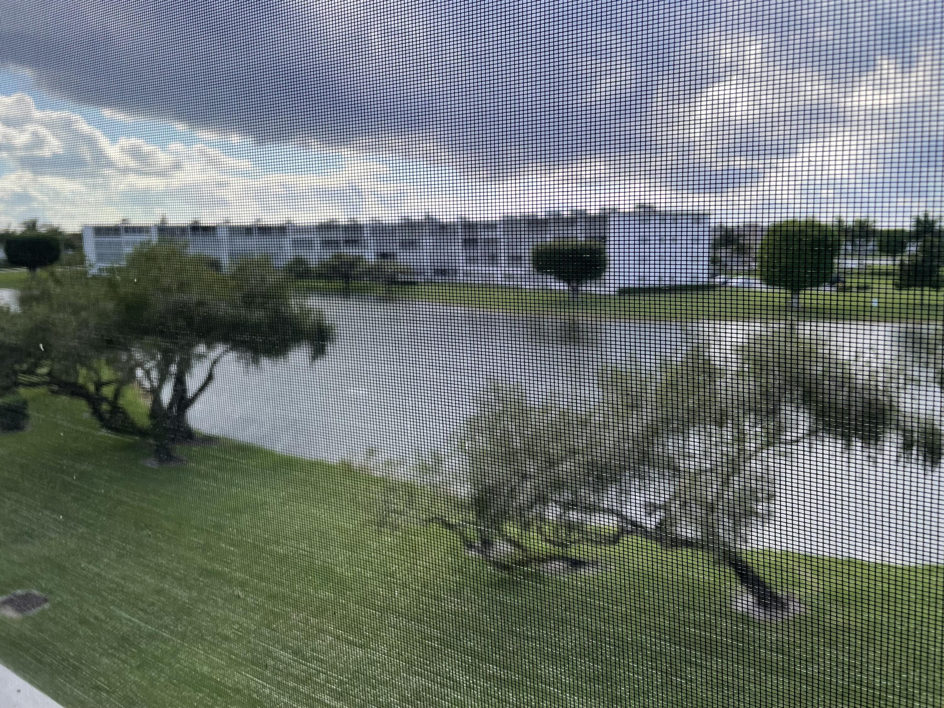 3025 Hythe B, Unit 3025B Boca Raton, FL 33434 - Photo 1 of 19 Lake View from Patio