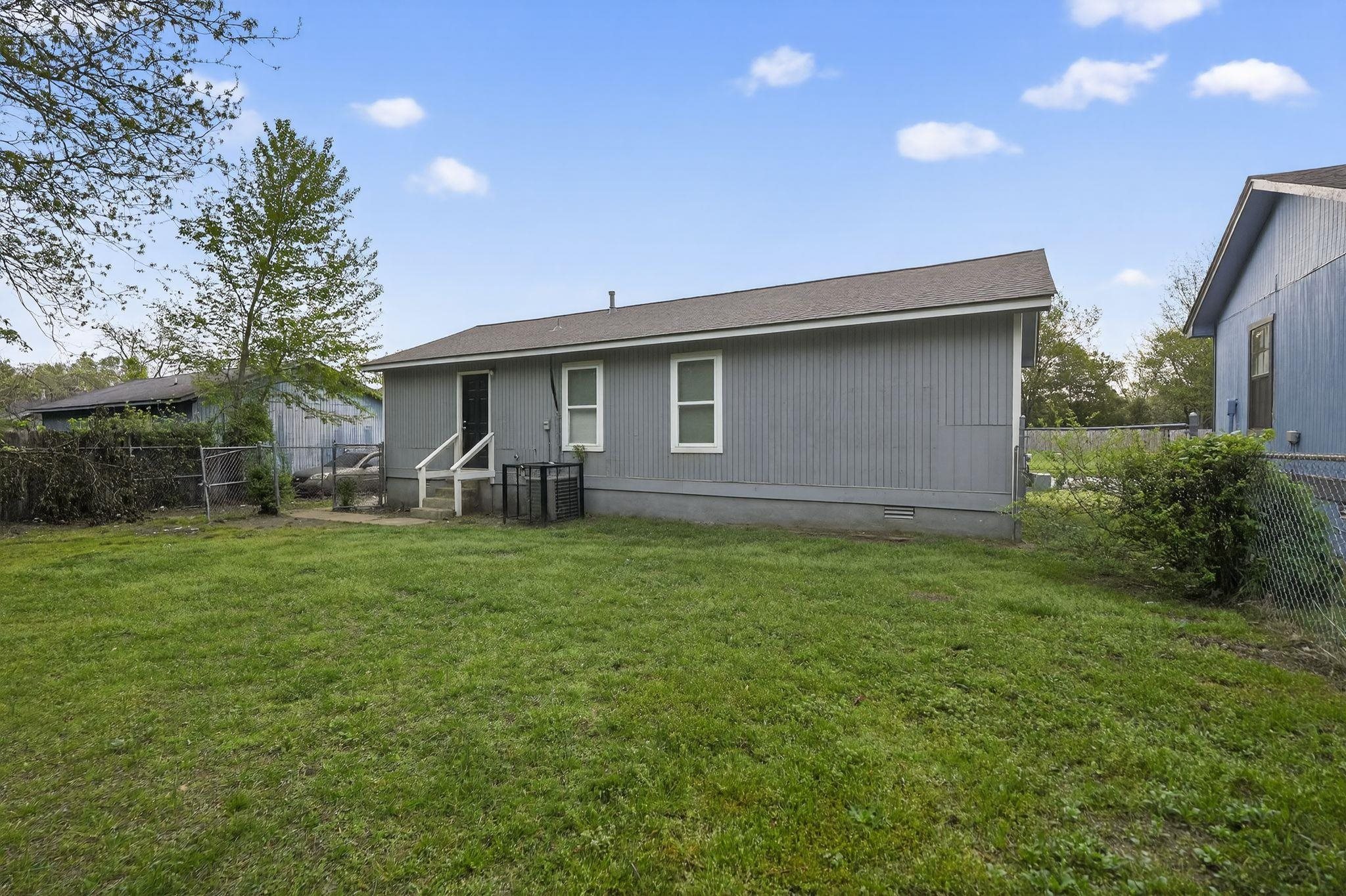 4725 Lofts Road Memphis, TN 38118 - Photo 32 of 32 Back of house featuring a fenced backyard