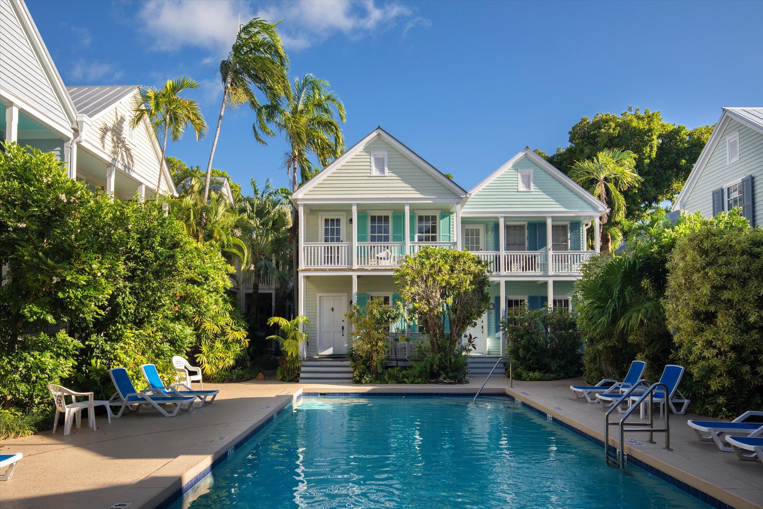 606 Truman Avenue, Unit 7 Key West, FL 33040 - Photo 44 of 49 a front view of a house with swimming pool