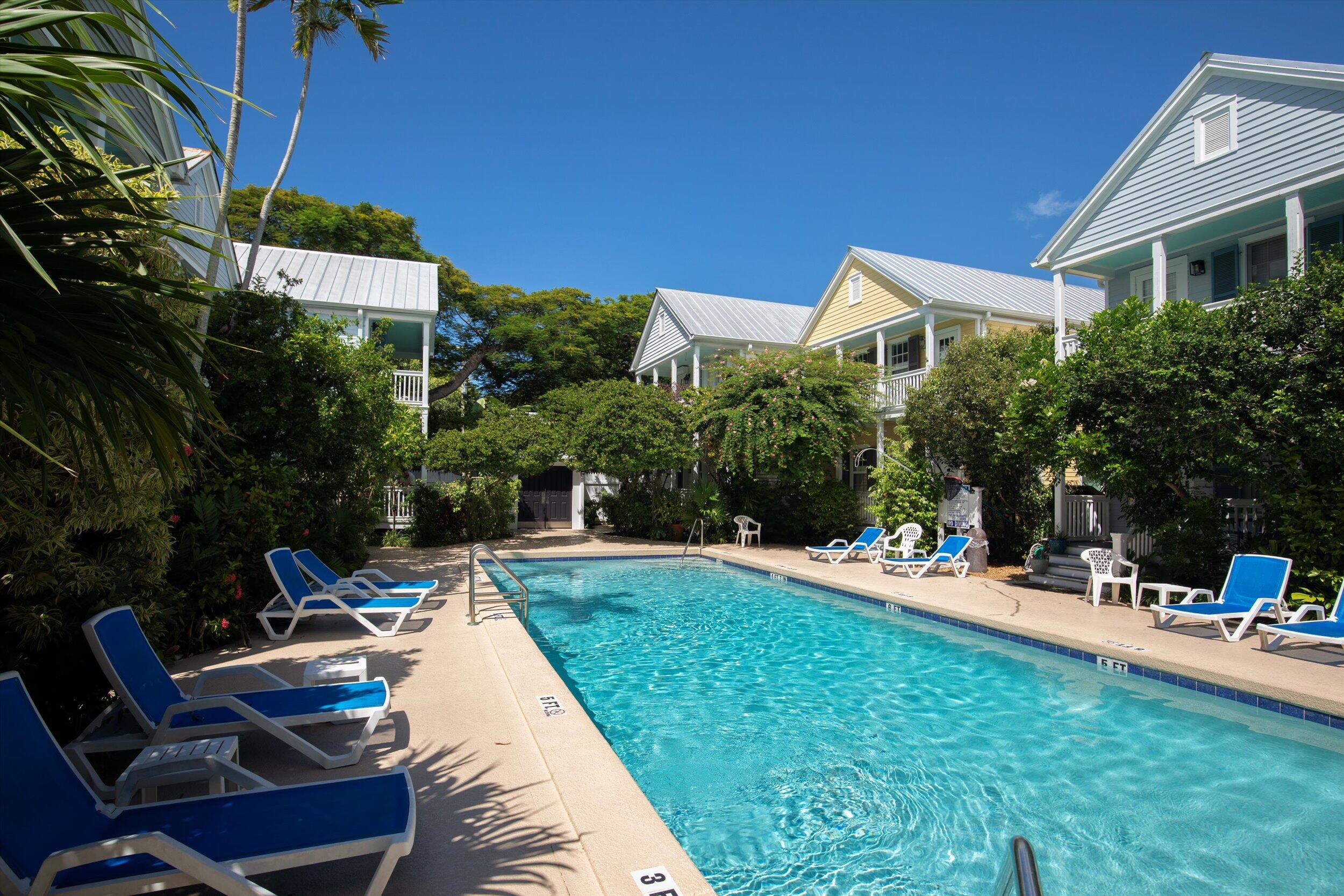 606 Truman Avenue, Unit 7 Key West, FL 33040 - Photo 46 of 49 a view of outdoor space yard deck and patio