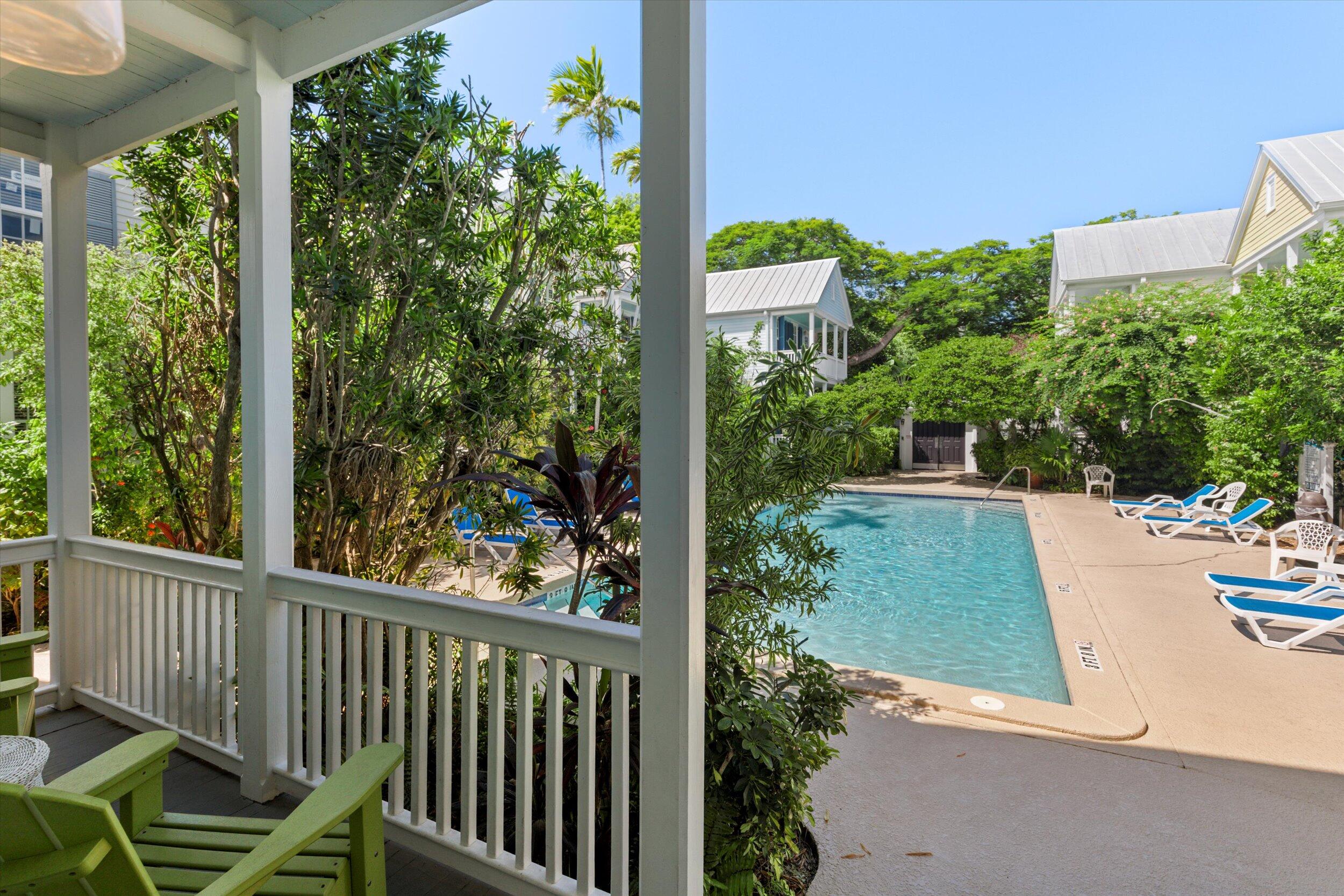 606 Truman Avenue, Unit 7 Key West, FL 33040 - Photo 5 of 49 a view of a garden from a balcony