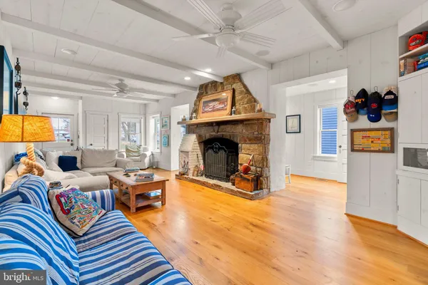 a bedroom with a bed and glass window