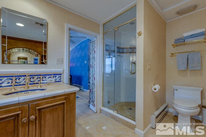 572 Ridge Street Reno, NV 89501 - Photo 22 of 25 a view of bathroom with a sink and a shower