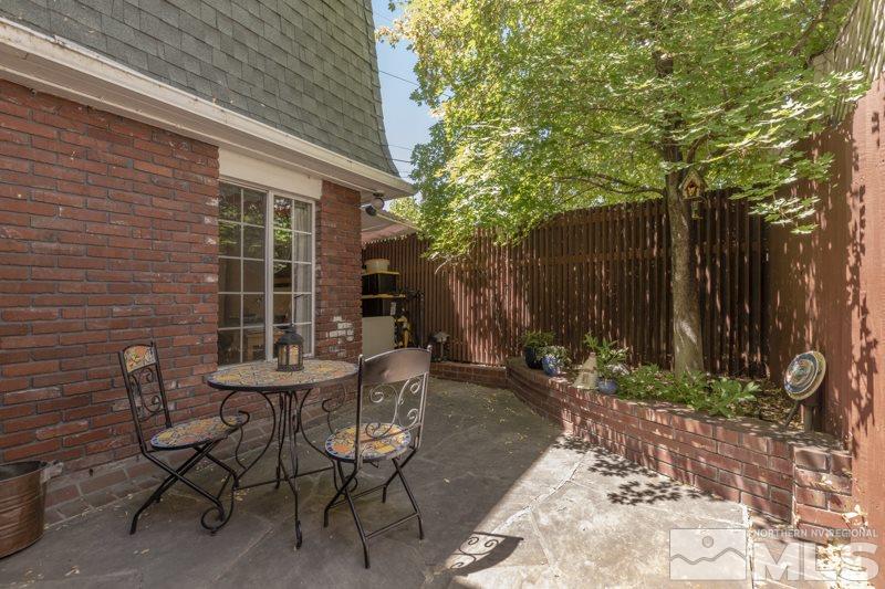 572 Ridge Street Reno, NV 89501 - Photo 23 of 25 a view of a bench in a backyard