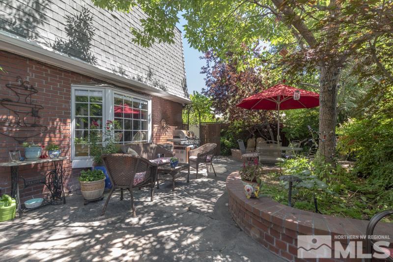 572 Ridge Street Reno, NV 89501 - Photo 24 of 25 a view of backyard with outdoor seating and trees