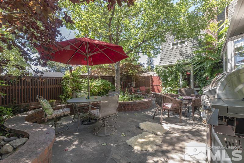 572 Ridge Street Reno, NV 89501 - Photo 25 of 25 a view of a patio with table and chairs under an umbrella