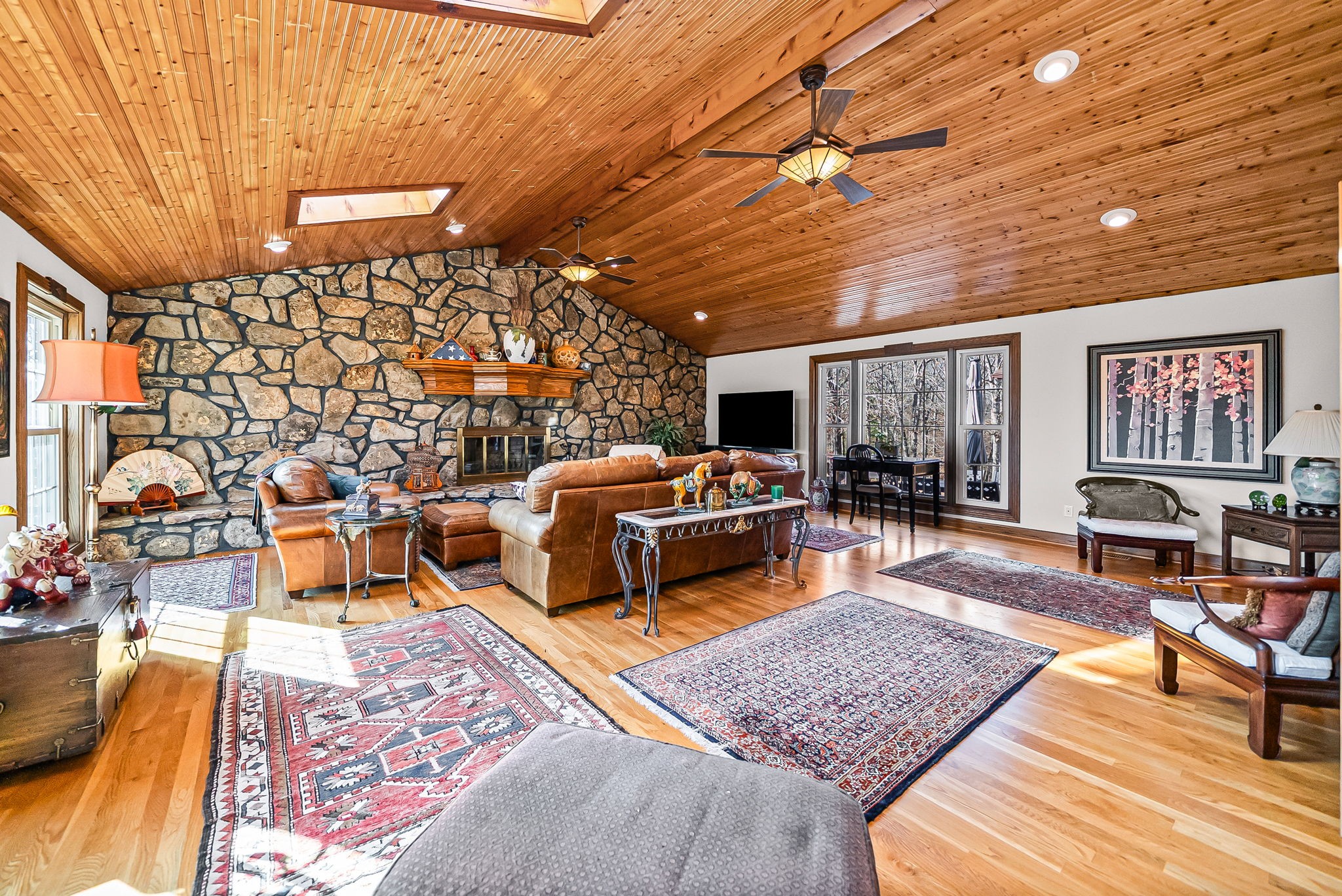 2419 Williams Hollow Road McEwen, TN 37101 - Photo 17 of 85 a living room with patio furniture and a rug