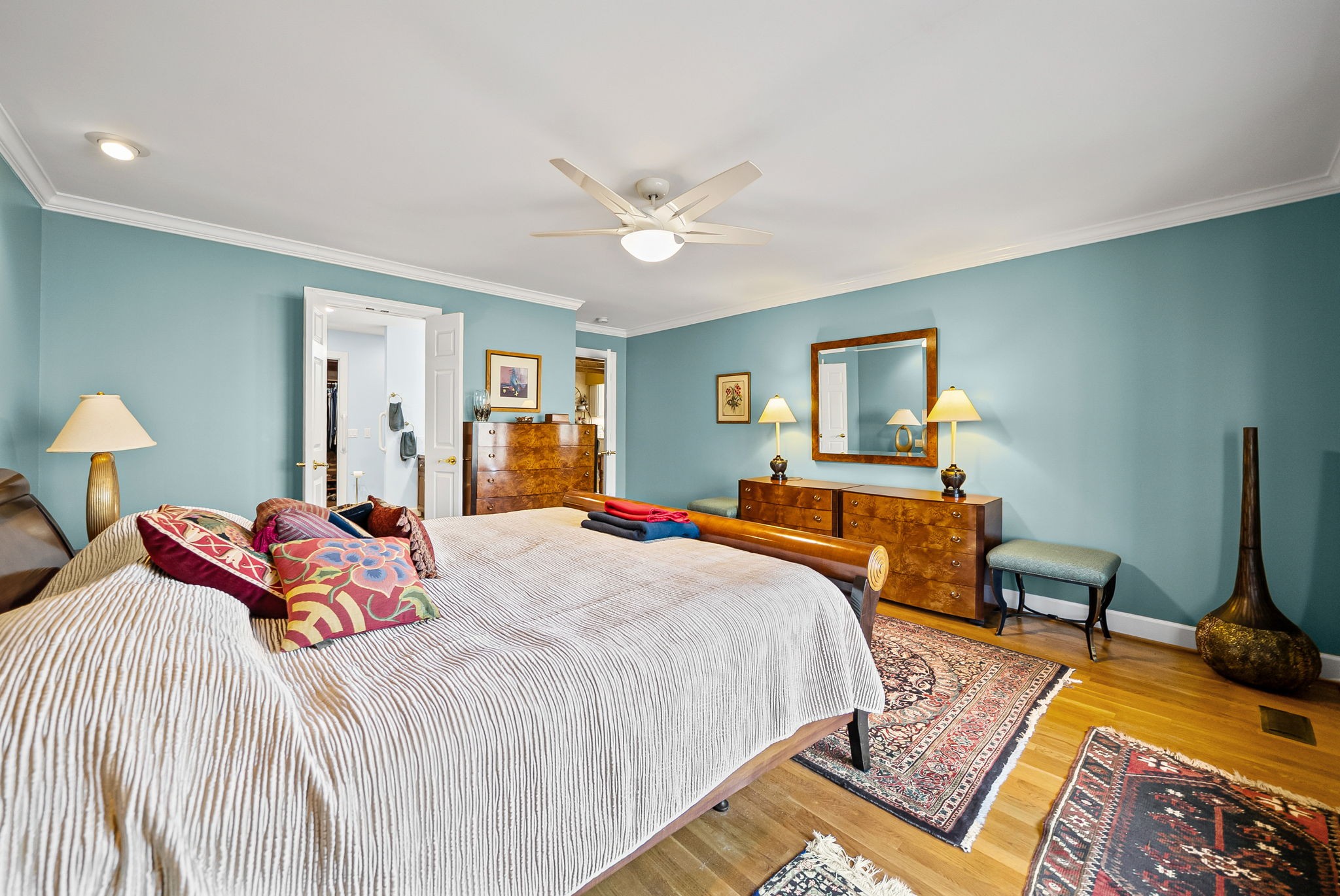 2419 Williams Hollow Road McEwen, TN 37101 - Photo 21 of 85 a bedroom with a bed and a dresser in it