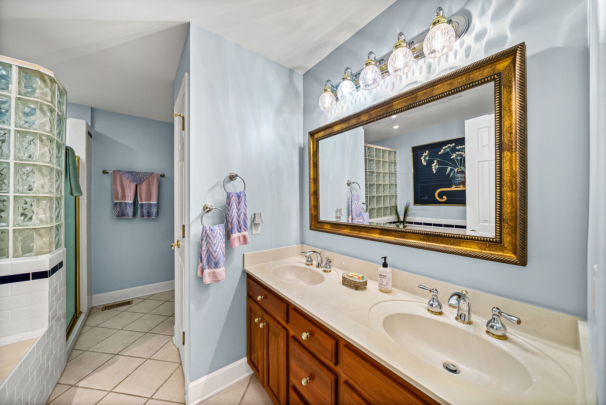 2419 Williams Hollow Road McEwen, TN 37101 - Photo 37 of 85 a bathroom with a sink vanity and mirror