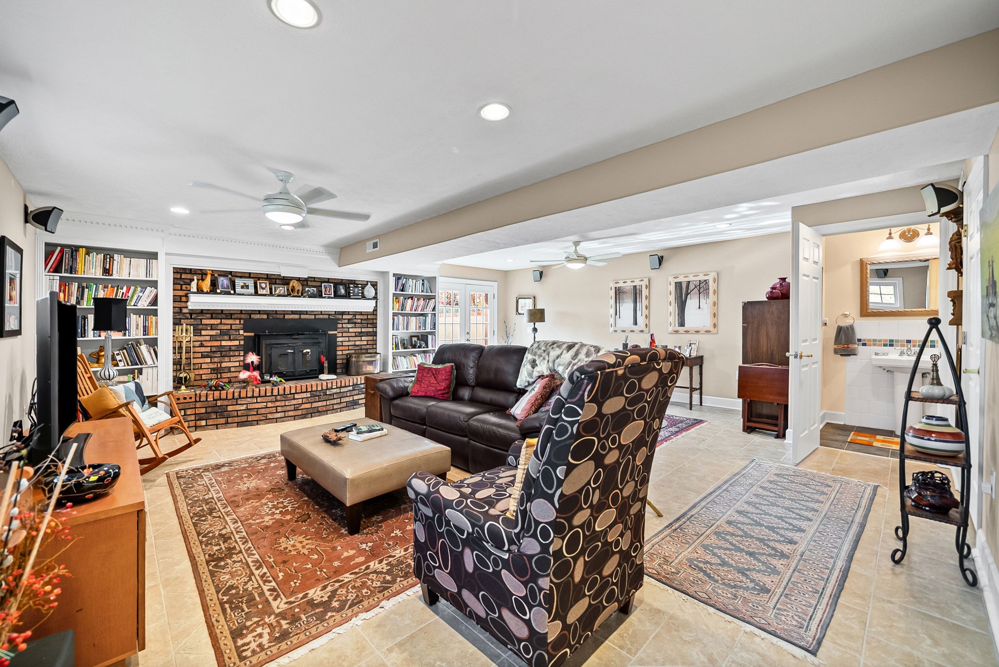 2419 Williams Hollow Road McEwen, TN 37101 - Photo 44 of 85 a living room with furniture or couch and a flat screen tv