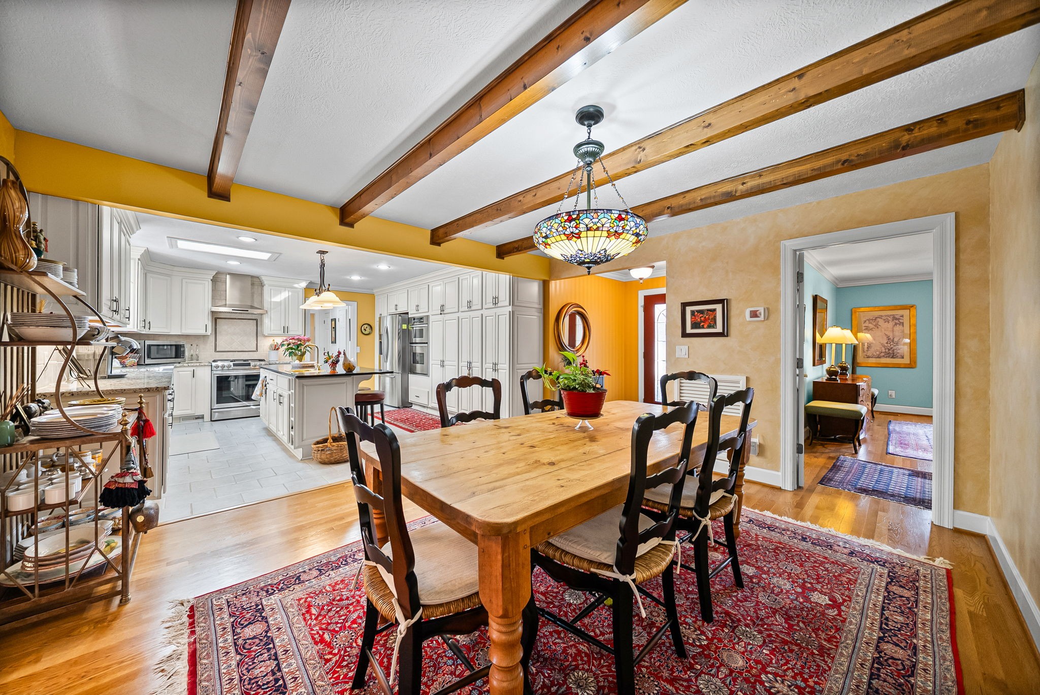 2419 Williams Hollow Road McEwen, TN 37101 - Photo 9 of 85 a view of a dining room with furniture and wooden floor