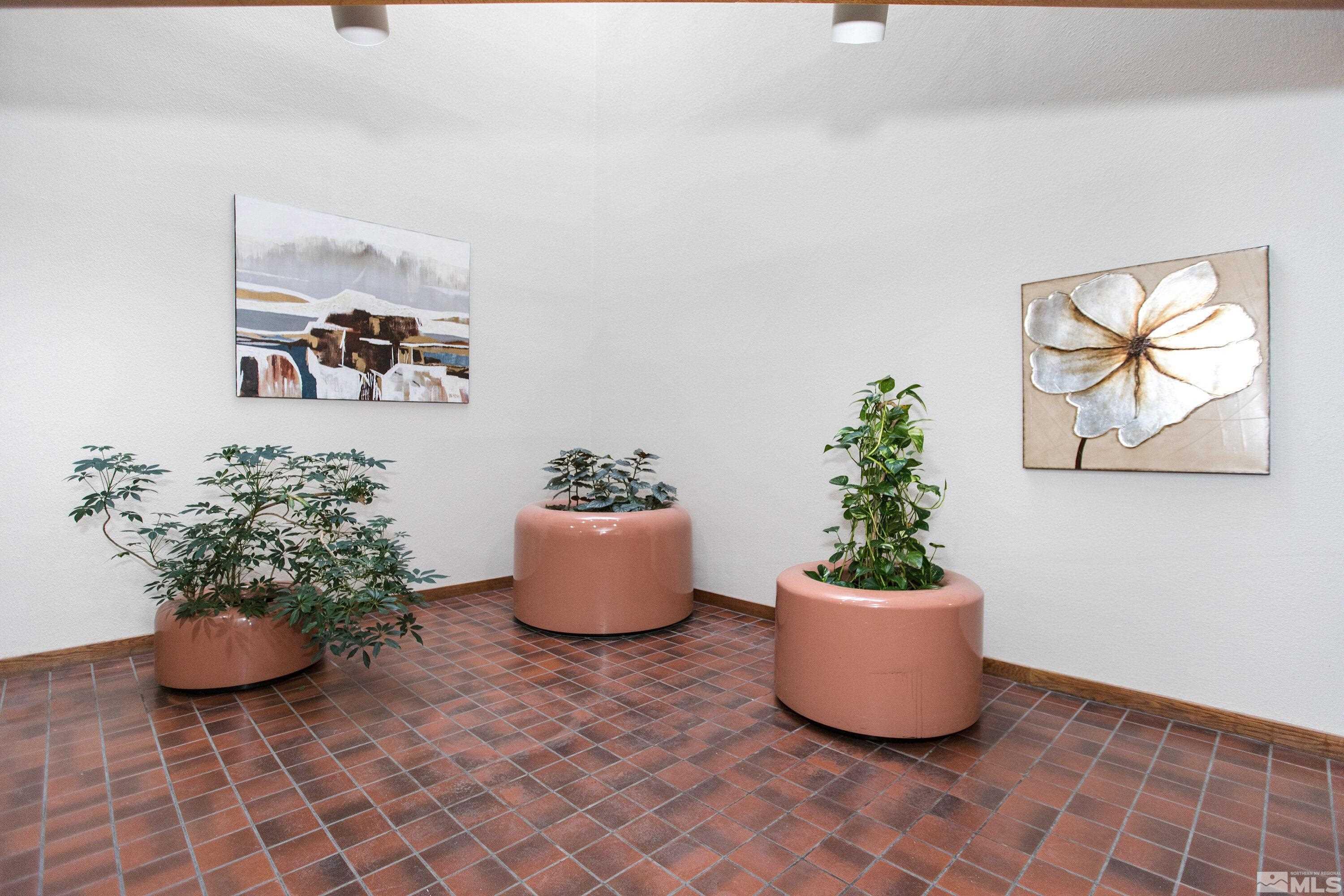 3095 Lakeside Drive, Unit 304 Reno, NV 89509 - Photo 38 of 38 a view of a room with a potted plant and a potted plant
