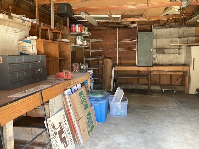 326 East Wilson Street Rialto, CA 92376 - Photo 17 of 19 a view of a storage room with water heater and racks