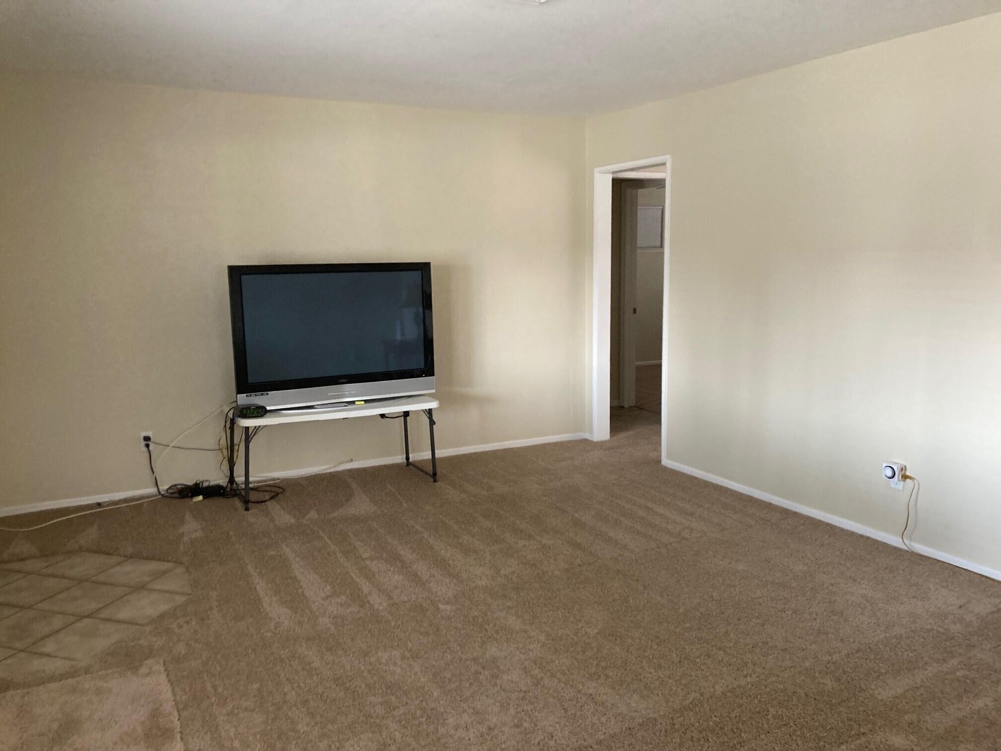 326 East Wilson Street Rialto, CA 92376 - Photo 3 of 19 a view of an empty room with furniture