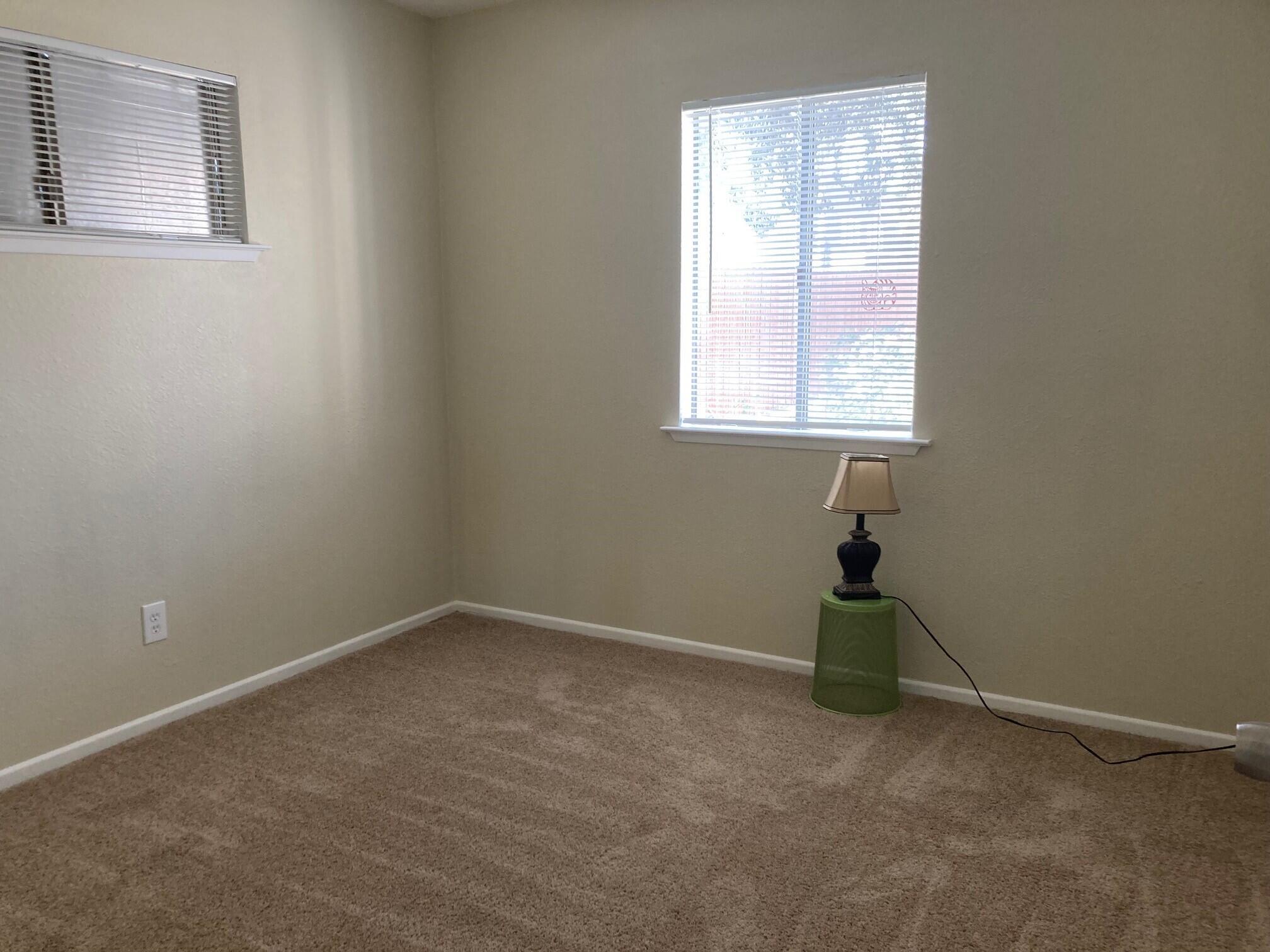 326 East Wilson Street Rialto, CA 92376 - Photo 8 of 19 an empty room with a window