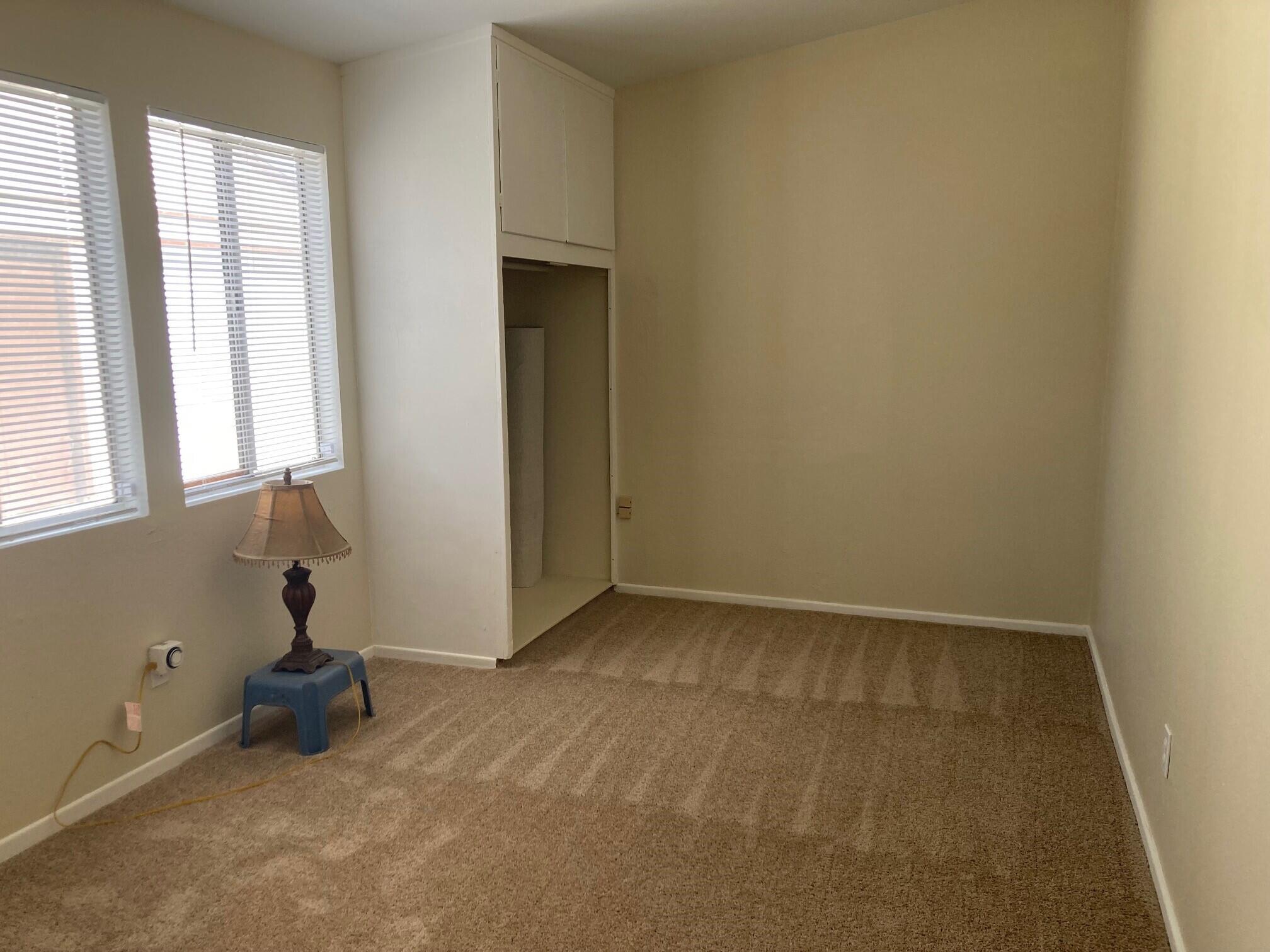 326 East Wilson Street Rialto, CA 92376 - Photo 9 of 19 an empty room with windows