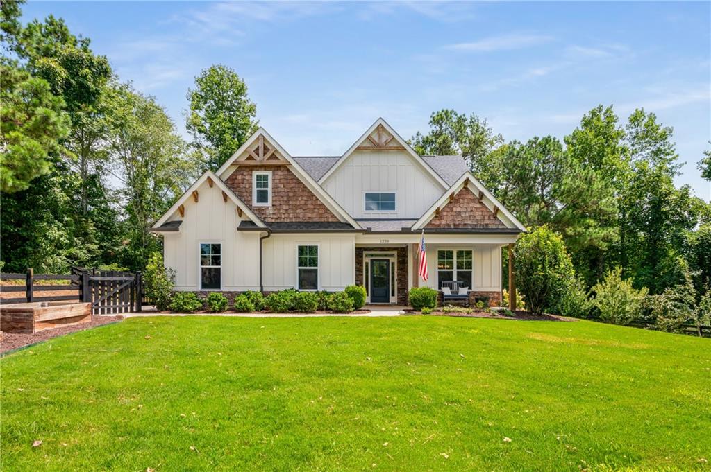 1238 Upper Burris Road Canton, GA 30114 - Photo 1 of 1 a front view of house with yard and green space