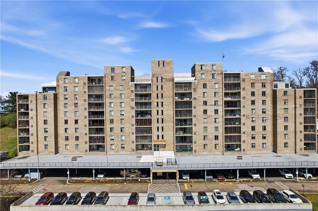 2160 Greentree Road, Unit 705W Pittsburgh, PA 15220 - Photo 1 of 32 a front view of a building with a street