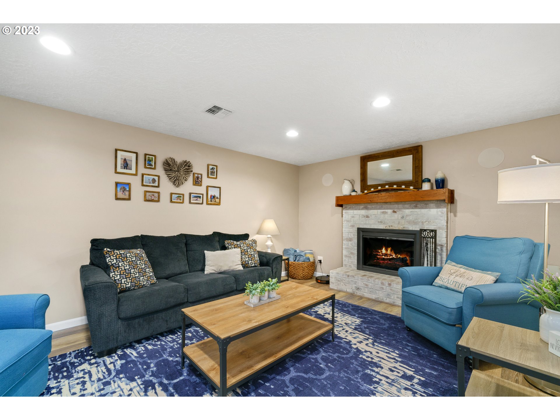 37185 Indian Gap Road Nehalem, OR 97131 - Photo 8 of 33 a living room with furniture and a fireplace