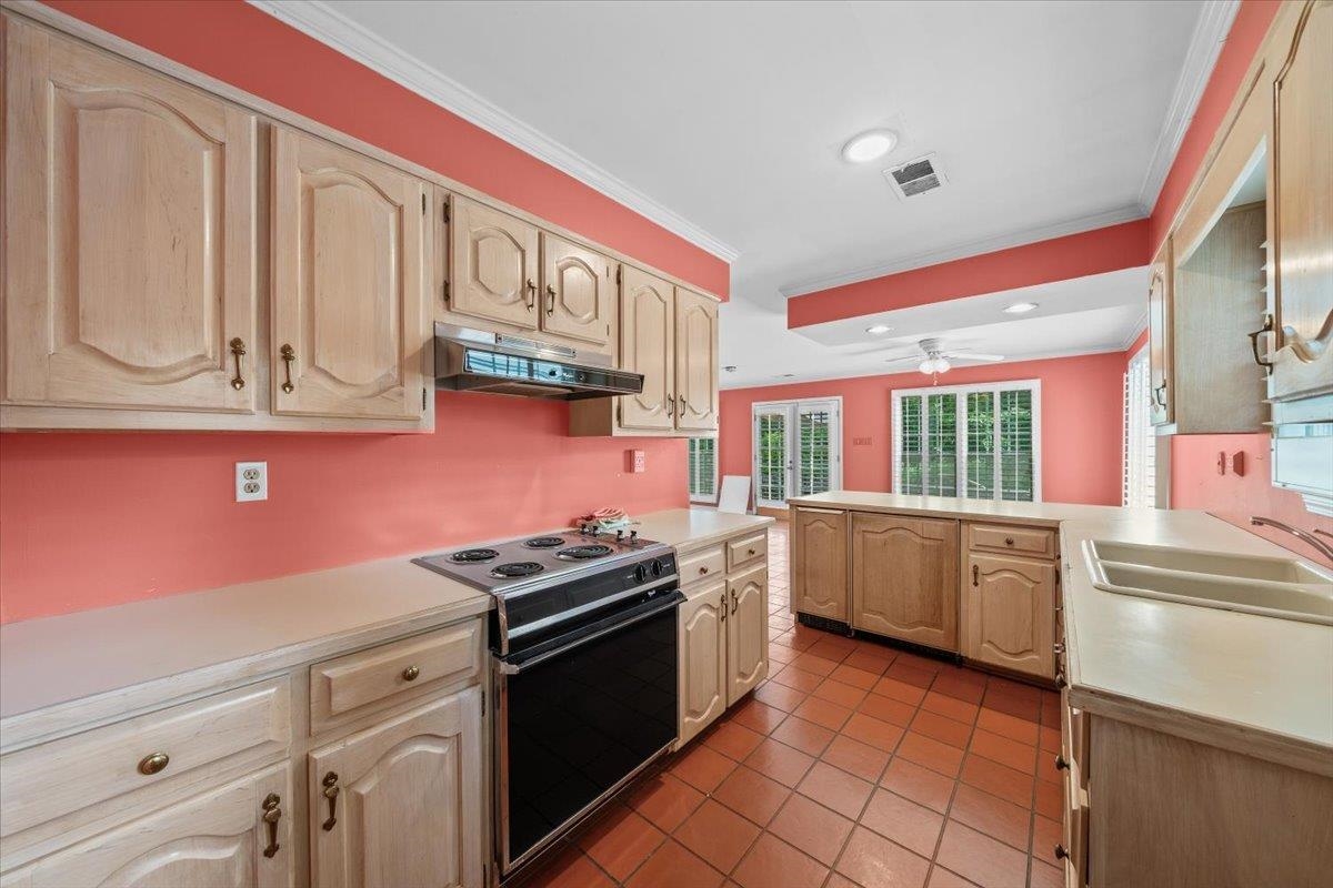 881 South Perkins Road Memphis, TN 38117 - Photo 29 of 33 Kitchen featuring range with electric cooktop, under cabinet range hood, light countertops, recessed lighting, and a ceiling fan
