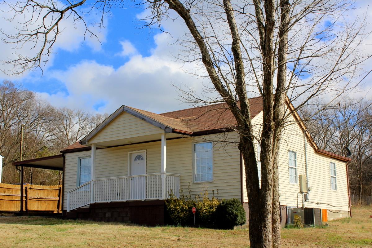 313 Randy Road Madison, TN 37115 - Photo 1 of 22 a view of a house with a yard